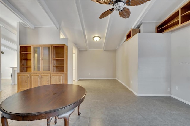 unfurnished dining area featuring ceiling fan and light tile patterned floors