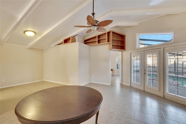 interior space featuring lofted ceiling with beams, ceiling fan, and french doors