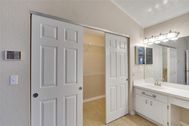 bathroom with vanity and tile patterned floors