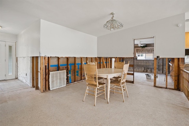 dining space featuring an inviting chandelier