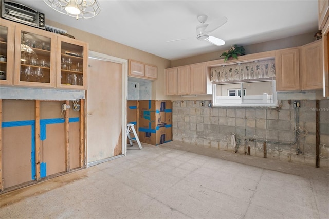 kitchen featuring light brown cabinets and ceiling fan