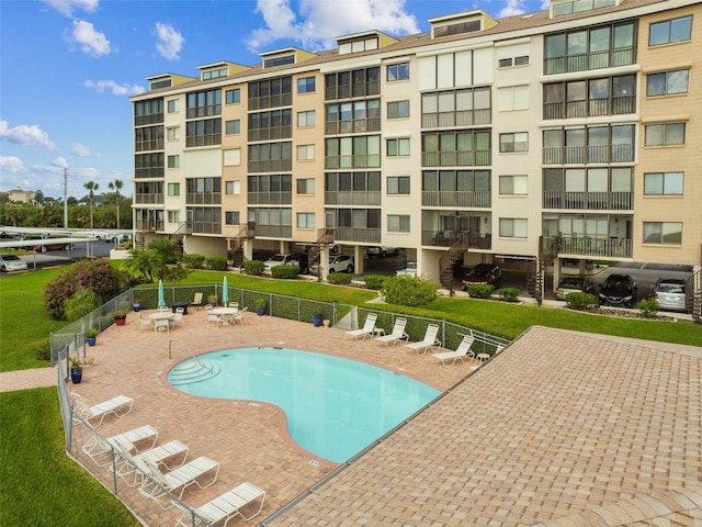 view of swimming pool featuring a patio