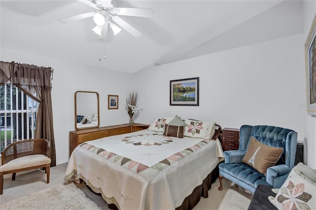 carpeted bedroom featuring ceiling fan and lofted ceiling