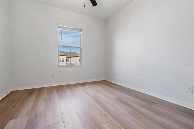 unfurnished room with ceiling fan and light hardwood / wood-style floors