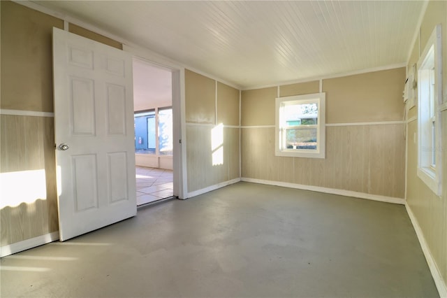 spare room with concrete floors