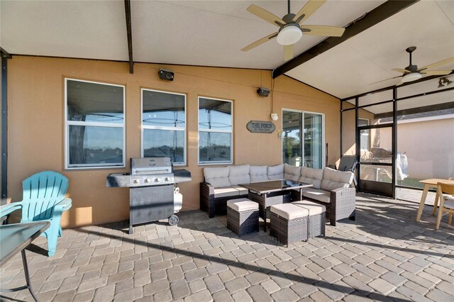 view of patio featuring ceiling fan, grilling area, and an outdoor hangout area