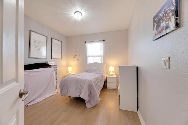 bedroom featuring light hardwood / wood-style floors