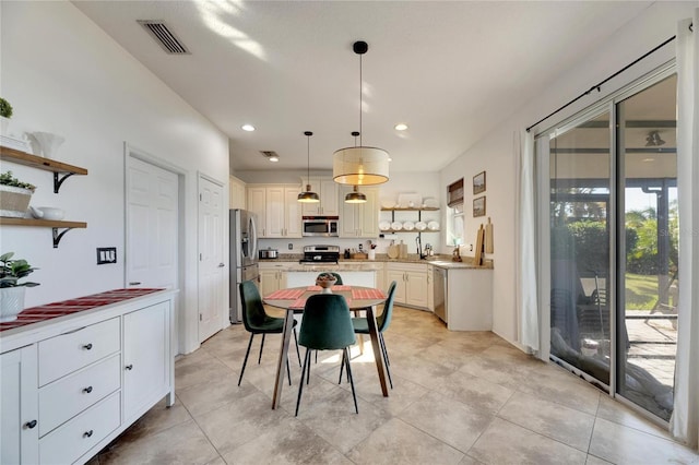 dining space with sink