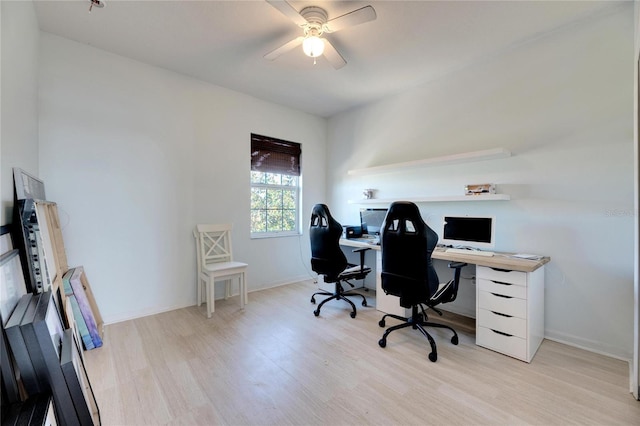 office space featuring light hardwood / wood-style floors and ceiling fan