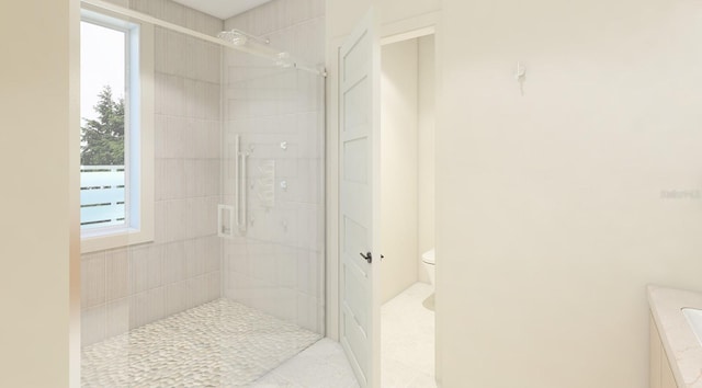 bathroom with toilet and walk in shower