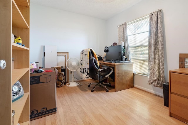 home office with light wood-type flooring