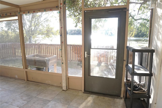 doorway featuring a water view