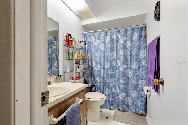 bathroom with a shower with shower curtain, tile patterned floors, vanity, and toilet