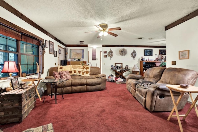 carpeted living room featuring ceiling fan, crown molding, and a textured ceiling