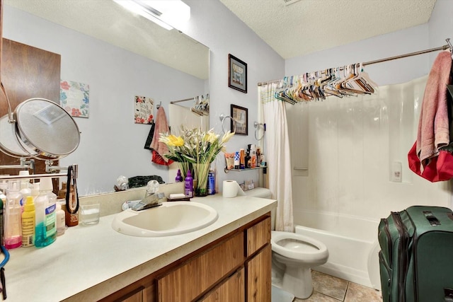 full bathroom with vanity, shower / bath combination with curtain, tile patterned flooring, toilet, and a textured ceiling