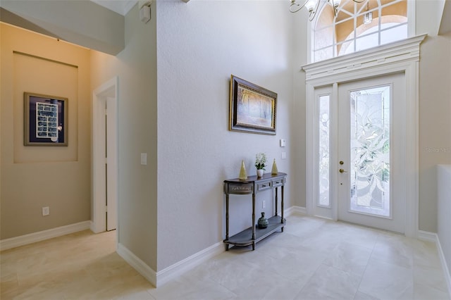 entrance foyer with an inviting chandelier