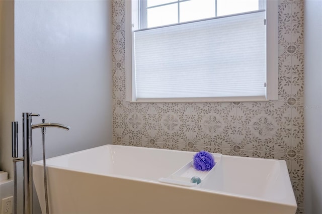 bathroom featuring a tub