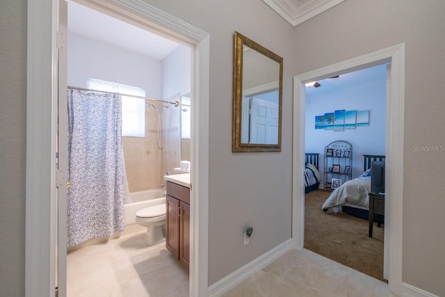 full bathroom featuring toilet, ornamental molding, vanity, and shower / bath combo with shower curtain