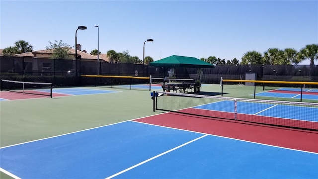 view of tennis court with basketball court