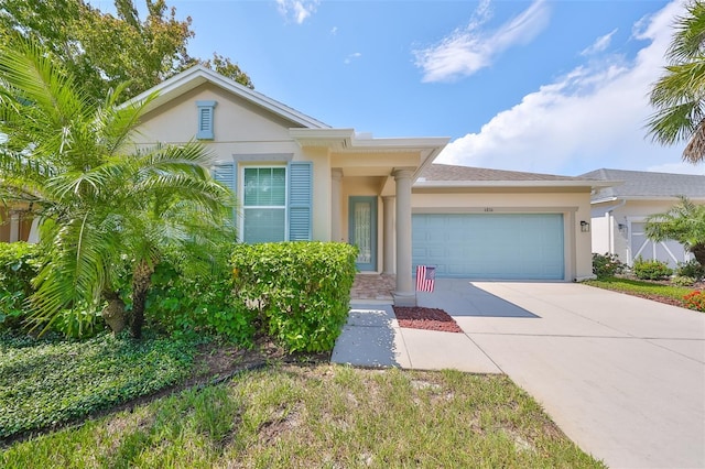 6836 Park Strand Dr, Apollo Beach, FL 33572 - ranch-style home with a garage