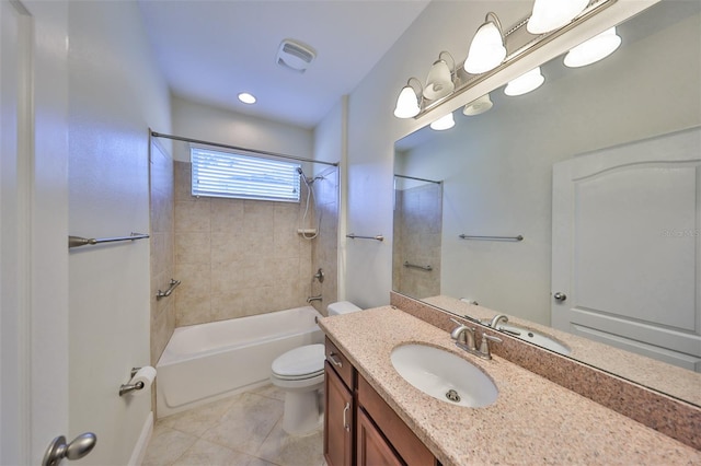 full bathroom with tile patterned floors, tiled shower / bath combo, toilet, and vanity