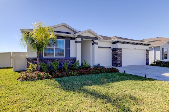 view of front facade featuring a front yard and a garage