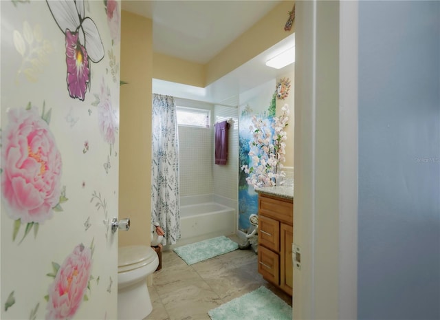 full bathroom with shower / bath combo with shower curtain, vanity, and toilet