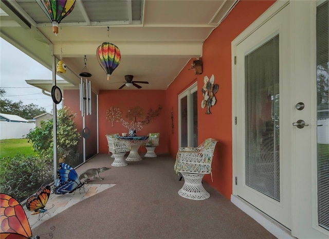 view of patio featuring ceiling fan