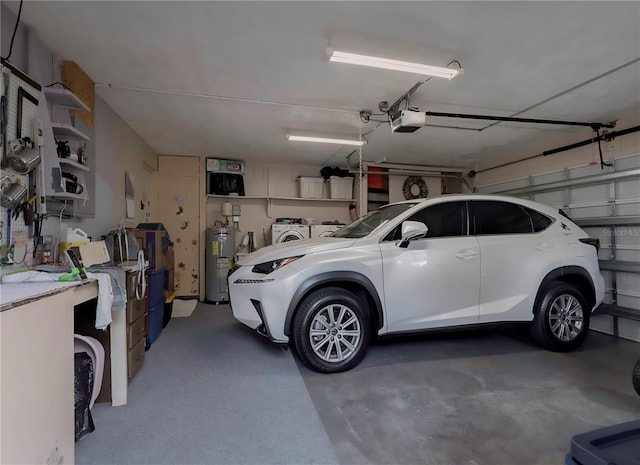 garage with electric water heater, washer and clothes dryer, and a garage door opener