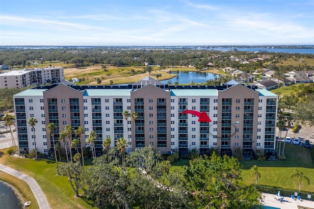 birds eye view of property featuring a water view