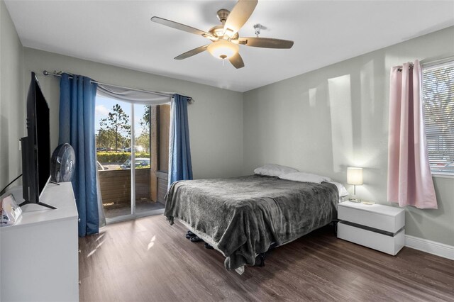 10265 Gandy Blvd N Unit 905, Saint Petersburg, FL 33702 - bedroom featuring access to exterior, wood finished floors, multiple windows, and ceiling fan