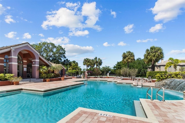 community pool with a patio