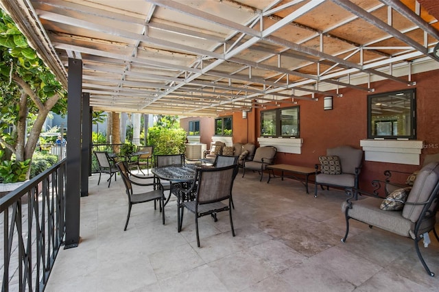 view of patio featuring outdoor dining area and an outdoor living space