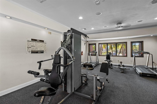 exercise room with recessed lighting and baseboards