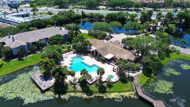 10265 Gandy Blvd N Unit 905, Saint Petersburg, FL 33702 - drone / aerial view of a pool area and a large body of water