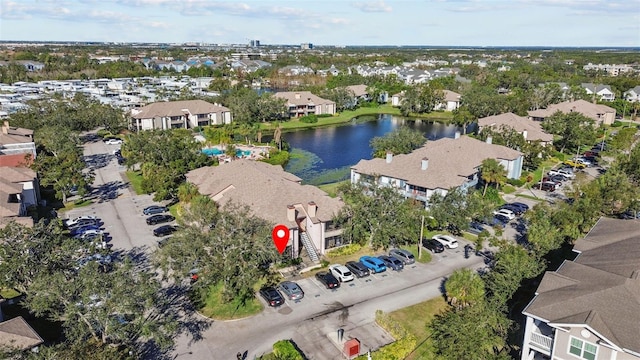 drone / aerial view with a water view