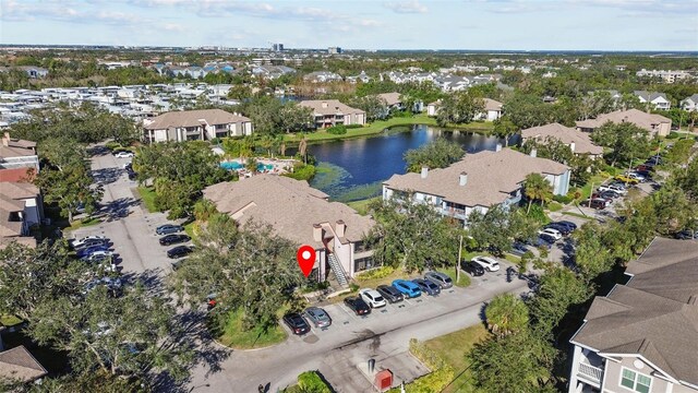10265 Gandy Blvd N Unit 905, Saint Petersburg, FL 33702 - aerial view of property and surrounding area featuring a large body of water and nearby suburban area
