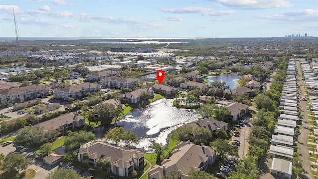 birds eye view of property featuring a water view