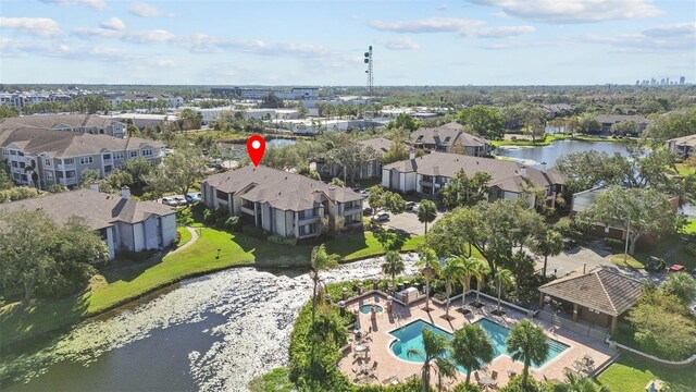 10265 Gandy Blvd N Unit 905, Saint Petersburg, FL 33702 - aerial view of property's location featuring a pool, a nearby body of water, and nearby suburban area