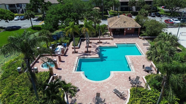 community pool with a patio