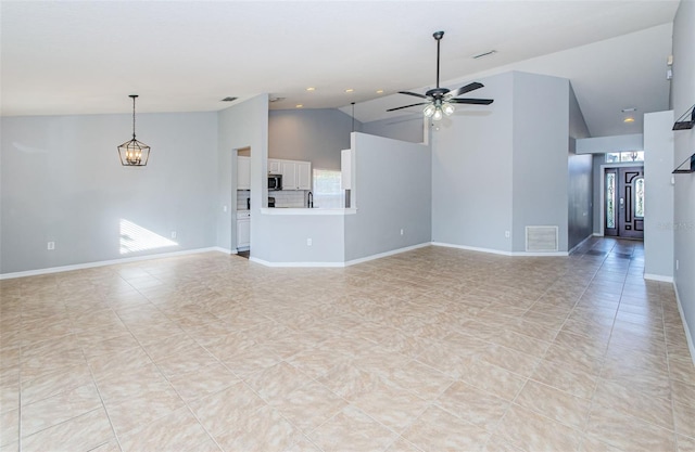 unfurnished living room featuring high vaulted ceiling, baseboards, visible vents, and ceiling fan with notable chandelier