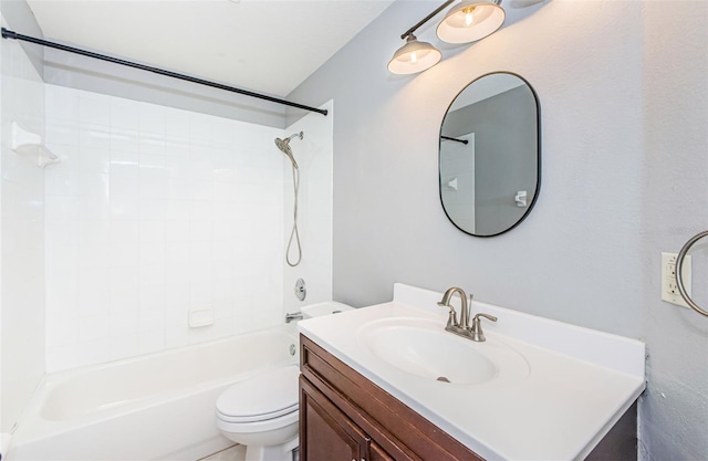 full bathroom with shower / bathing tub combination, vanity, and toilet