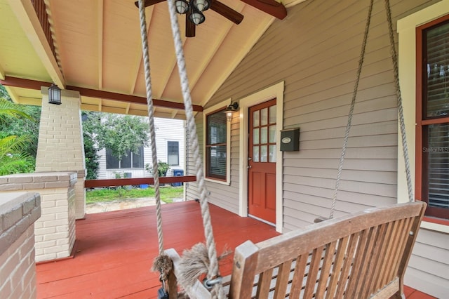 exterior space with covered porch and ceiling fan