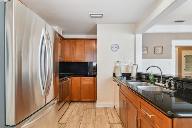 kitchen featuring stainless steel appliances and sink