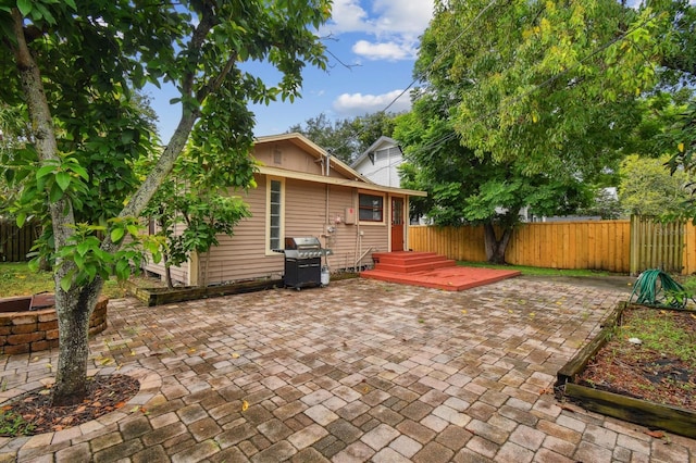 view of patio / terrace with area for grilling and a deck