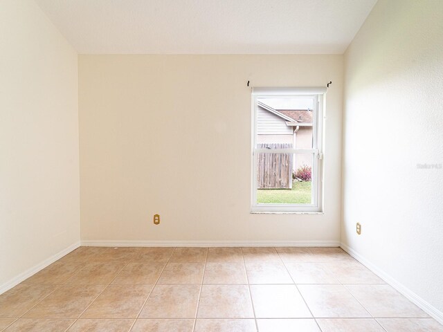 view of tiled spare room