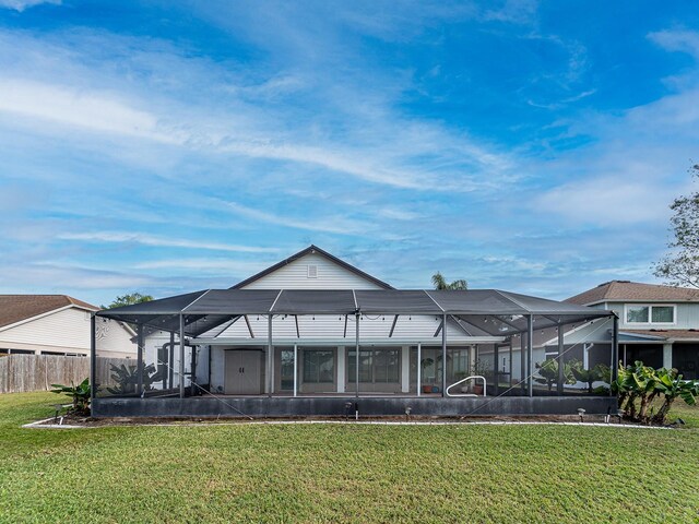 1515 Lions Club Dr, Brandon, FL 33511 - back of property featuring glass enclosure