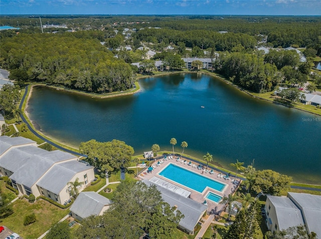 birds eye view of property featuring a water view