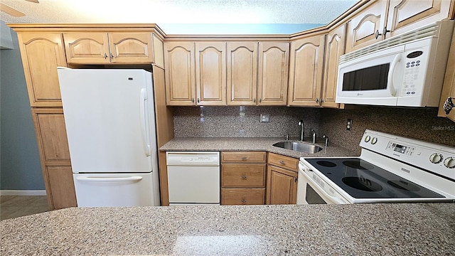 kitchen with sink, light brown cabinets, backsplash, a textured ceiling, and white appliances