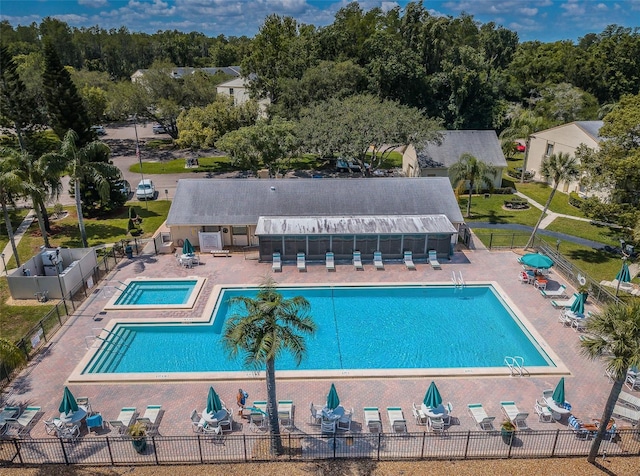 view of pool featuring a patio area